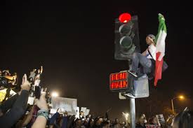 Image result for protestors carrying mexican flags